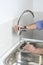 Installing a faucet in a stainless steel kitchen sink