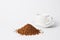 Instant coffee slide and cup for espresso on white background