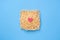 Instant noodles on blue background with red heart, fast food love concept. Ramen