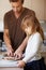 Instilling good eating habits. A little girl making breakfast with her father.