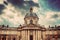 Institut de France in Paris. Famous cupola, dome against clouds