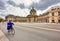 institute de france and woman on bicycle