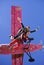 An instructor and a skydiving student have fun jumping out of an airplane.