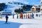 Instructor teaching Group of Children skiing on Penken Park Austria