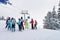 Instructor teaching Group of Children skiing on Zillertal Arena