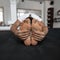 Instructor young man sits in lotus position and meditates. Trainer does yoga. Close-up of male bare feet