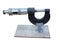 Instrument micrometer on white background. Mechanical instrument for measurement from steels