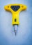 Insulated electric yellow screwdriver on metallic