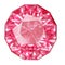 Insulated oval pink gemstone on white background.