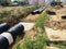 insulated water pipes in the trench construction site