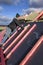 Insulation and waterproofing of the roof surface, the worker nails the film to the boards