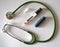 Insulin pen for diabetics with a green stethoscope around