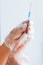 Insulin syringe with a needle in the hands of a cosmetologist, Botox injections