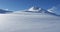 Intact snow in the foreground and mountains view in the background 4K