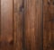 intense brown maple wooden wall with verticle shingles from Sicily