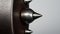 Intense Close-up: Dark Silver Spike Handle On Brown Leather Object