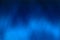 Intense deep blue blurred gradient background texture