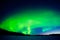 Intense display of Northern Lights at morning dawn