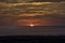 Intense, fiery sky at sunset on Hawaii island.