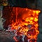 Intense heat and fiery sparks inside a glassblower's furnace