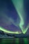 Intense northern lights, Aurora Borealis at a bay near Honningsvag and the Nordkapp, North Cape, Finnmark, Norway