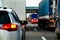 Intense traffic flow of trucks and cars on a highway.