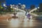 Intentionally defocused and blurred night image of traffic going across a bridge. Taken in Georgetown Washington DC, over the Key