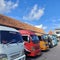 inter-city vehicles parked neatly at the terminal