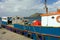 An inter-island ferry loading goods at the grenadines wharf, st. vincent