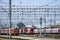 Intercity and regional passenger trains on the tracks near the platforms of the railway station Perm-2, Russia