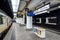 An InterCity train is leaving an empty platform in Brussels Central station in Belgium