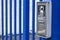 Intercom buzzer on a blue gate