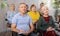 Interested elderly man listening lesson during language courses