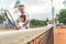 Interested father teaching son to play tennis