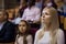 Interested woman theatergoer watching stage performance in theater