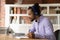 Interested young african american man listening educational lecture.