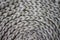 Interesting background made of crochet hand-made, gray cotton cord