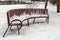 Interesting bench in an old park in winter.