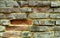 Interesting colorful background of old brick.Ancient wall. Wallpaper, picture. Design.