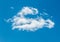 Interesting Cumulus Fractus Clouds in Bright Blue Sky