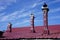 An interesting decorated chimney and roof on an infield house in the provincial town of Gorodets in Russia