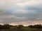 Interesting dramatic clouds open countryside plain background la