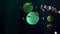 Interesting green cartoon planet, rotating over black background, looking as if coming from popular angry birds game.