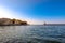 Interesting photo of Chania harbor with bird between old town and lighthouse.