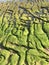 An interesting relief of the Spanish coast - green algae on the stones create a pattern.