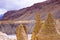 Interesting sandy pyramid by the river in mountain