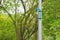 An interesting solution to repairing a high and unreachable, broken, Thai park light pole, using simple materials.