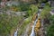 Interesting unusual visible on a mountain waterfall on a sunny day for background or screensaver