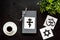 Interfaith dialogue concept. World religions symbols near book on black background top view