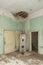 Interior of an abandoned mansion. Empty room deserted and derelict. The interior of an abandoned castle. Damaged and demolished fi